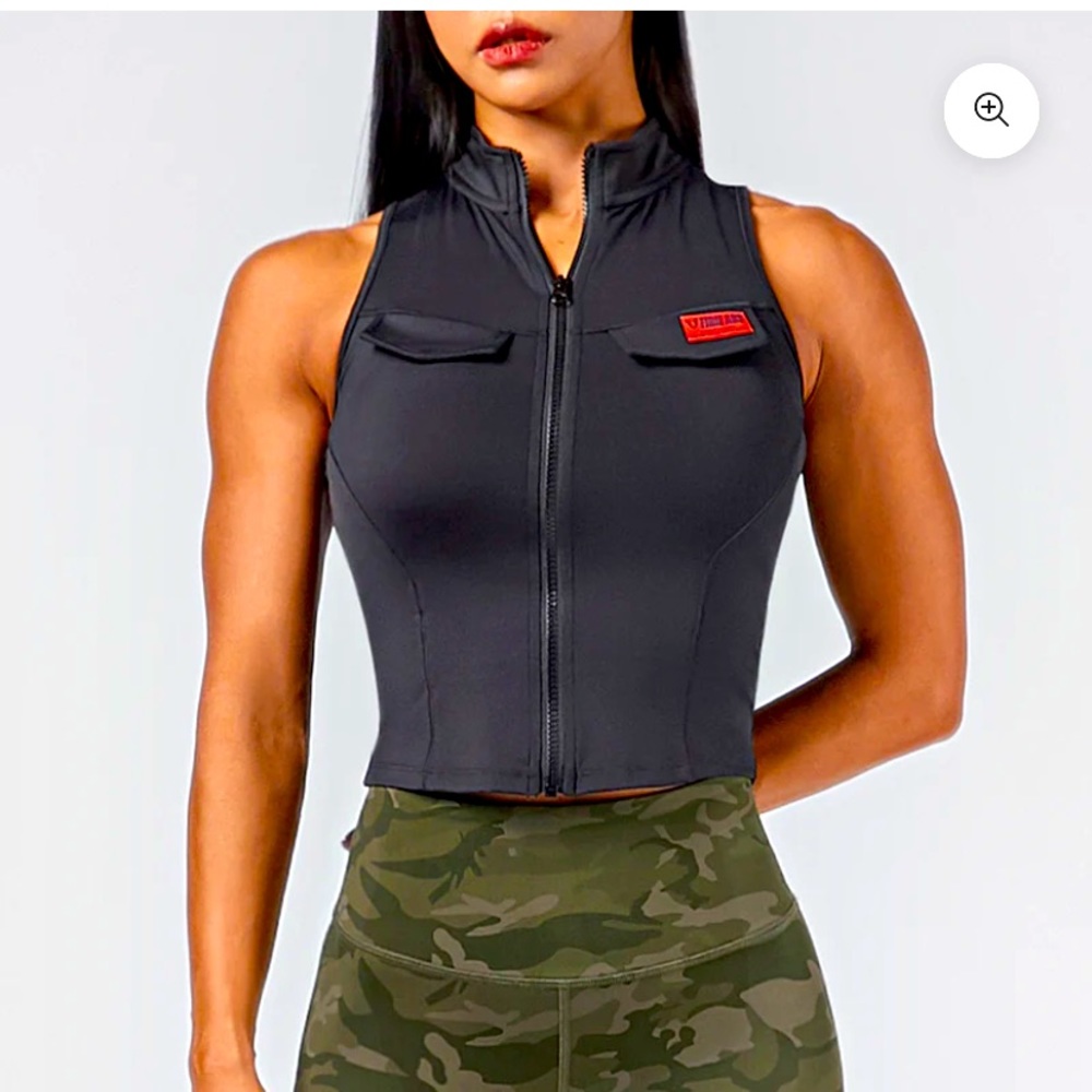 Firm Abs black vest/zip tank. Size small.